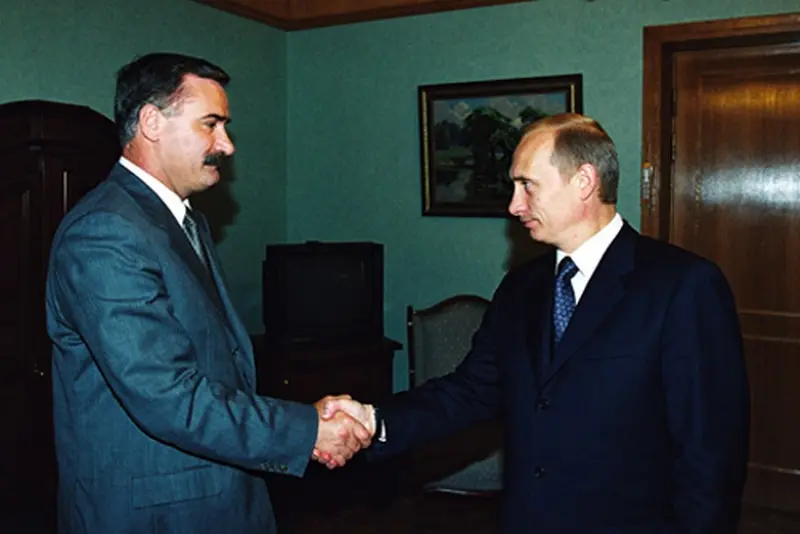 Ruslan Aushev un Vladimirs Putins