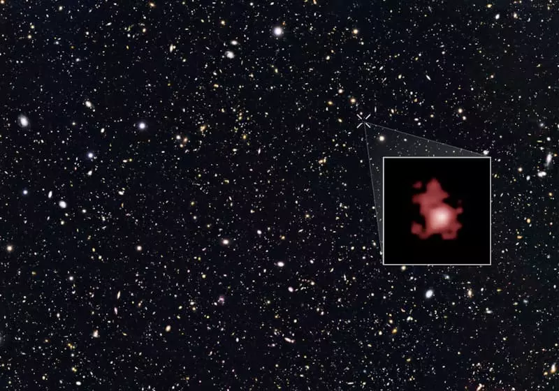 Galaxy Galaxy Gal-z11-ren argazkia Hubble teleskopioak hartu zuen, argiak 13.4 bilioi urtekoa izan zenetik (https://hubblesite.org/contents/News-Releses/2016/2016-2016-07 .html)