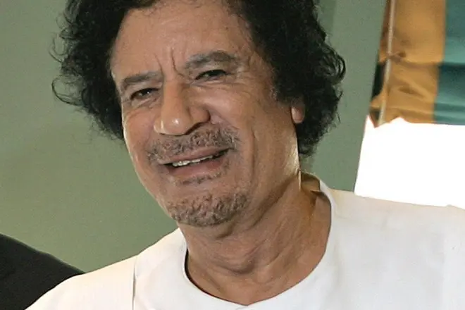 Muammar Gaddafi。