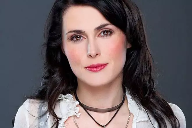 Vocalist Sharon Den Adel