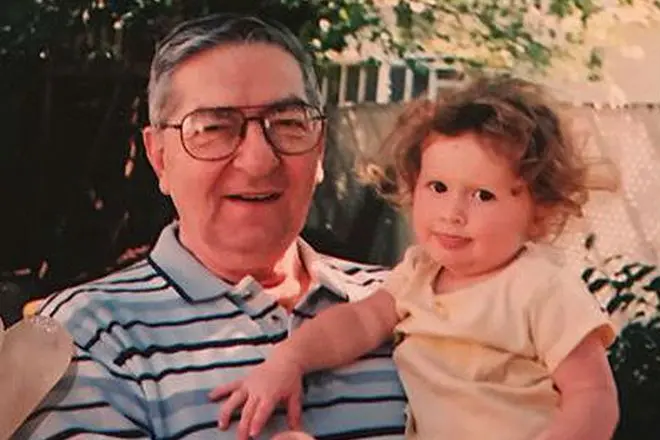 Emma Kinny in childhood with grandfather