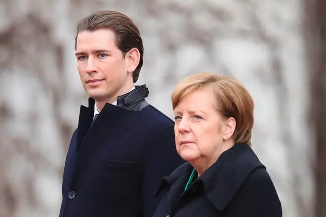 Sebastian Kurtz en Angela Merkel