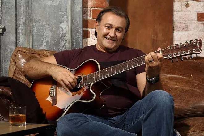 Valery Kuras with a guitar