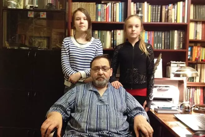Mikhail Ugarov with granddaughters