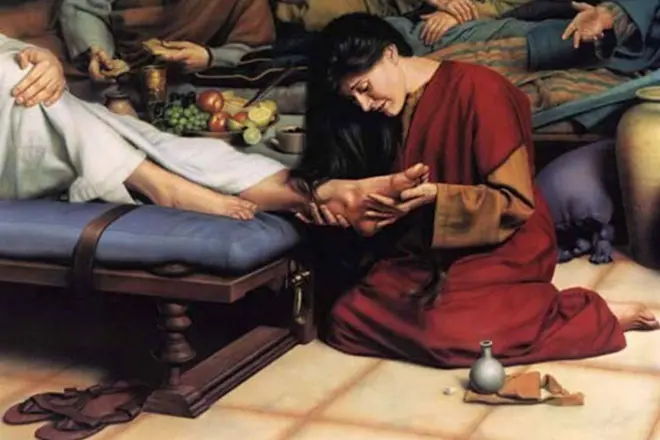 Η Maria Magdalene σηκώνει τα πόδια του στον Ιησού Χριστό