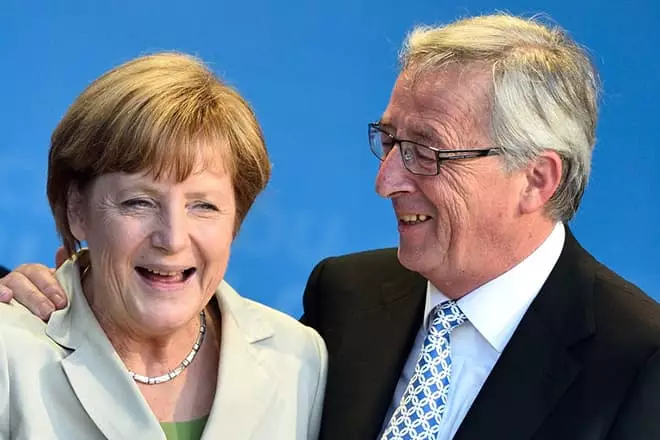 Jean-Claude Juncker en Angela Merkel