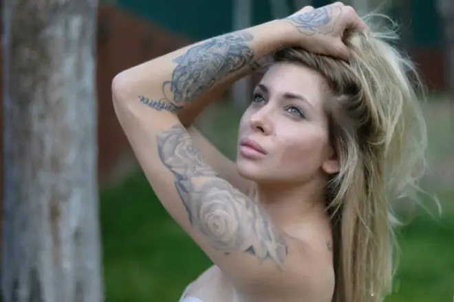 Tattoos Lisa Kutuzova.