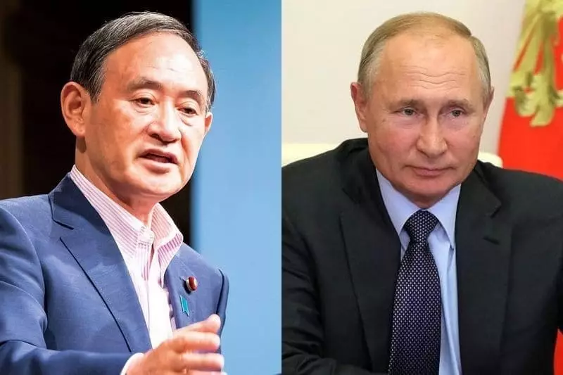 Yoshihide Sugar agus Vladimir Putin